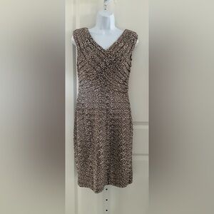 Adrianna Papell Sleeveless Sheath V-neck Animal Print Dress.
Size 8.
